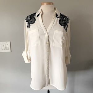 NWT express slim portofino blouse, ivory color with black lace accent. Large